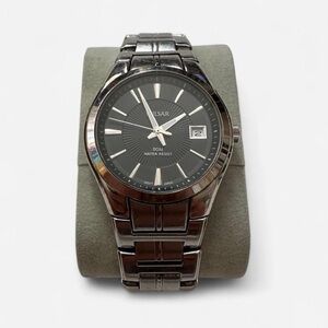 Vintage Pulsar Black Dial Silver Band Watch